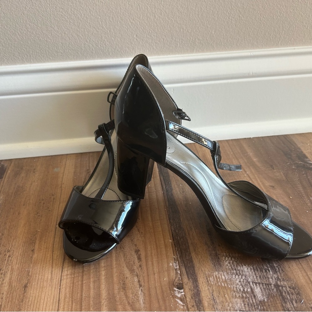 Woman’s black Patton leather Open toe strapped heals size 8 m